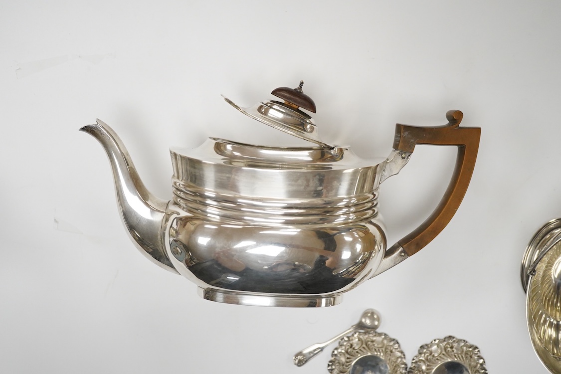 A late Victorian silver boat shaped sugar basket, by Thomas Bradbury & Sons, London, 1896, length 13.2cm, together with a pair of late Victorian repousse silver nut dishes and a silver condiment spoon. 4.8oz.